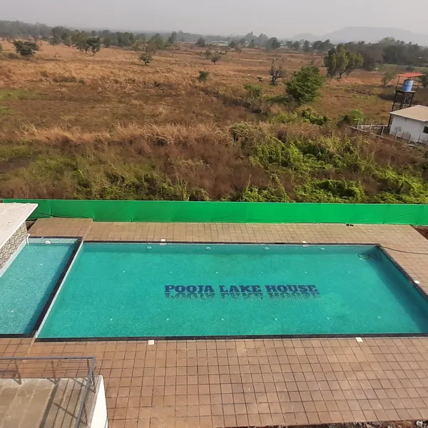 POOJA LAKE HOUSE 🏊 Swimming Pool